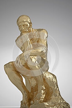 Golden thinker  isolated on white background 3D illustration