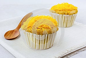 Golden threads on soft cupcake the Thai desserts