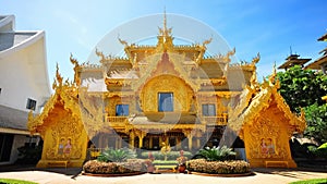 Golden toilet of Wat Rong Khun temple photo