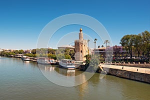 Golden tower Torre del Oro along the Guadalquivir river, Seville Andalusia , Spain.