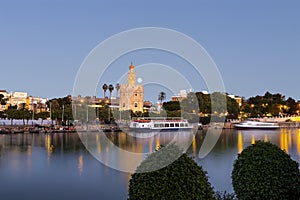 Golden tower Torre del Oro at sunset from the other side of th