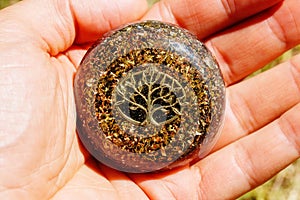 Golden tree on cristal. orgonite healing crystal.