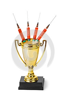 Golden trophy cup and syringes