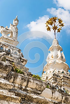 Golden umbrela and animals statue at Wat Saen Fang temple in Chiang Mai, Thailand.