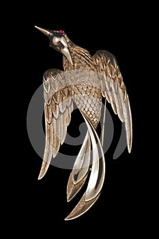 Golden vintage bird brooch