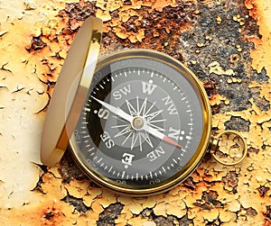 Golden vintage compass