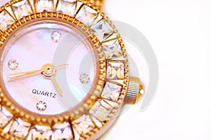 Golden watch with diamonds