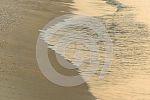 golden wave of sea texture