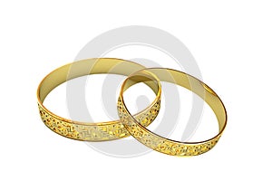 Golden wedding rings with magic tracery