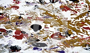 Golden white black blue red paint blurred spots abstract background