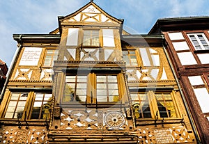 Golden and white half-timbered house in Miltenberg, Germany