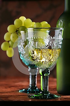 Golden wine in old-time goblet