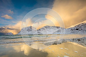 Golden winter morning at the northern sea and mountains