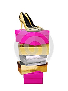 Golden Woman Shoes high heel on top of stacked boxes isolated