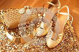 Golden. Womens clothes and accessories. Fashion Shoes. Luxury jewelry. Expensive pendant close-up background. Shiny Crystal