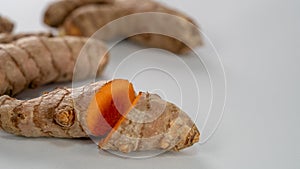 Golden Wonder: Sliced Turmeric Rhizome Isolated on White Backgroun