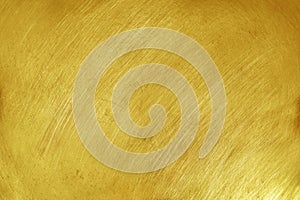 Golden yellow aluminium metal texture background, scratches on polished stainless steel