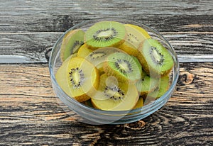 Golden yellow and green kiwi fruit slices