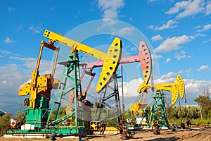 Golden yellow and pink Oil pump of crude oilwell rig