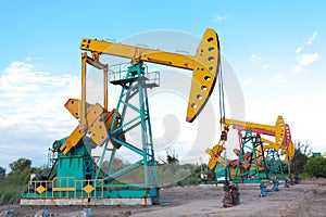 Golden yellow and pink Oil pump of crude oilwell rig