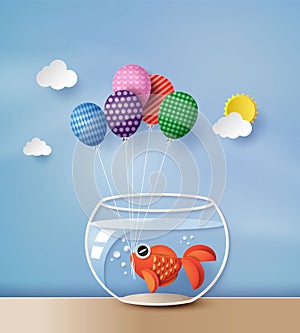 Goldfish with colorful balloon