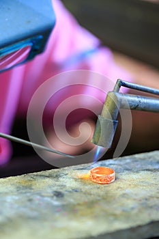 Goldsmith making ring