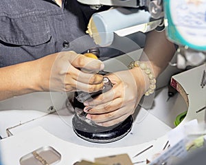 Goldsmith at work with traditional tools