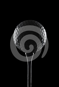 Golf ball on black background