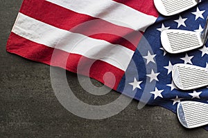 Golf ball with flag of USA on black background