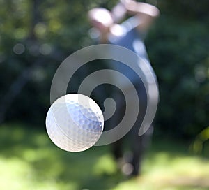 A golf ball in flight