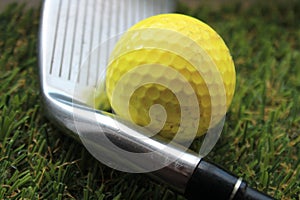 golf ball golf club grass background