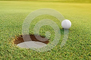 Golf ball on the green course