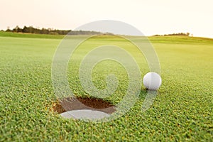 Golf ball on the green course