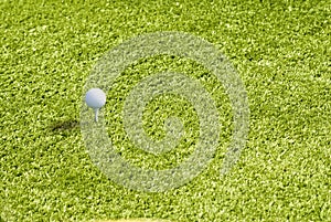 Golf ball on Green grass background