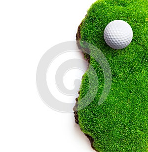 Golf ball on green grass