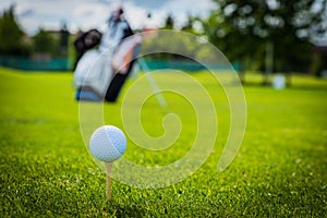 Golf ball on golf green grass natural fairway