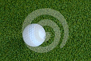 Golf ball green grass ready