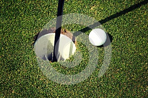 Golf Ball at Hole