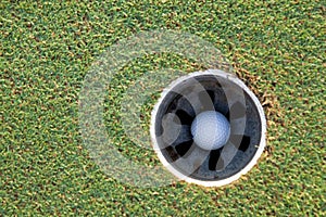 Golf ball in the hole. Sport sign