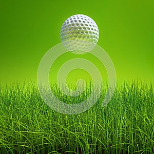 Golf ball on lawn over green