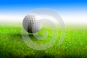 Golf ball on meadow