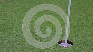 Golf Ball Misses Hole in Just-Missed Putt