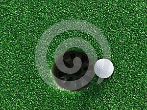 Golf ball near the hole