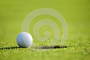 Golf ball near hole