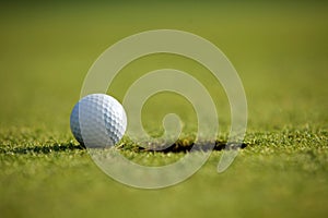 Golf ball near hole