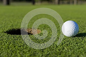 Golf Ball Near Hole