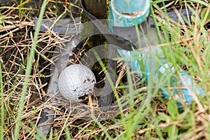 Golf ball near the tab water pipe