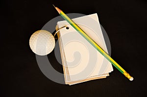 Golf ball with notebook score card