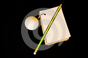 Golf ball with notebook score card