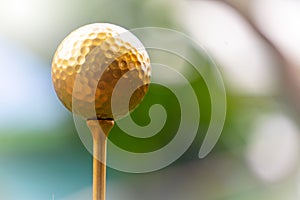 Golden golf ball is the world`s biggest sport